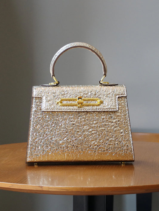 2026 high-end portable fashion handbag temperament bag stone handbag OL commuter Joker work bag light luxury stereotypes bag lad