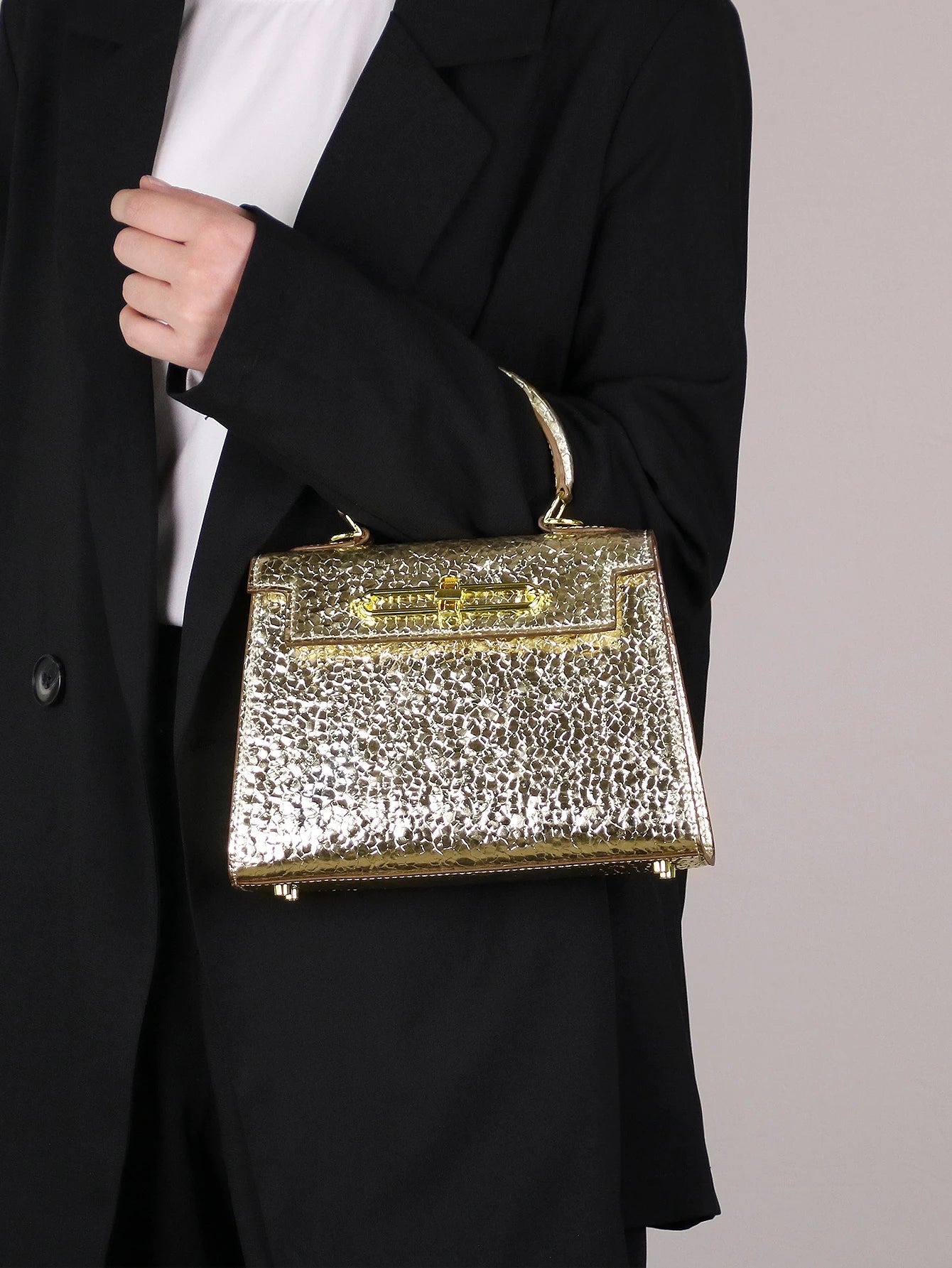 2026 high-end portable fashion handbag temperament bag stone handbag OL commuter Joker work bag light luxury stereotypes bag lad