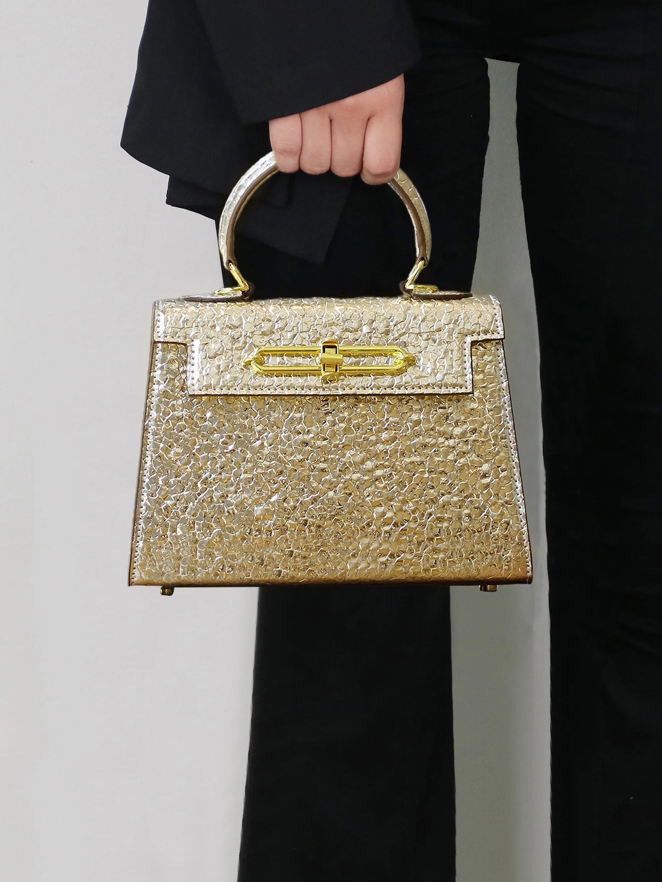 2026 high-end portable fashion handbag temperament bag stone handbag OL commuter Joker work bag light luxury stereotypes bag lad